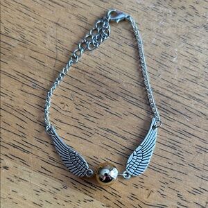 Silver Winged Bracelet with Gold Accent